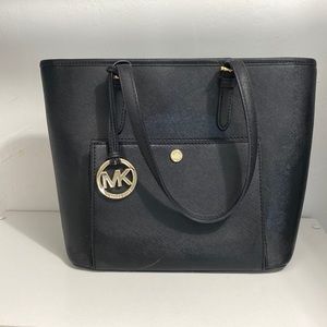Black Michael Kors purse.